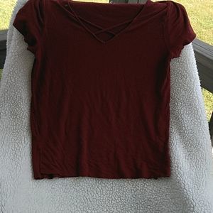 Top with cross cross at neck line